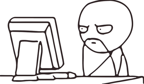 A person pausing to think at a computer